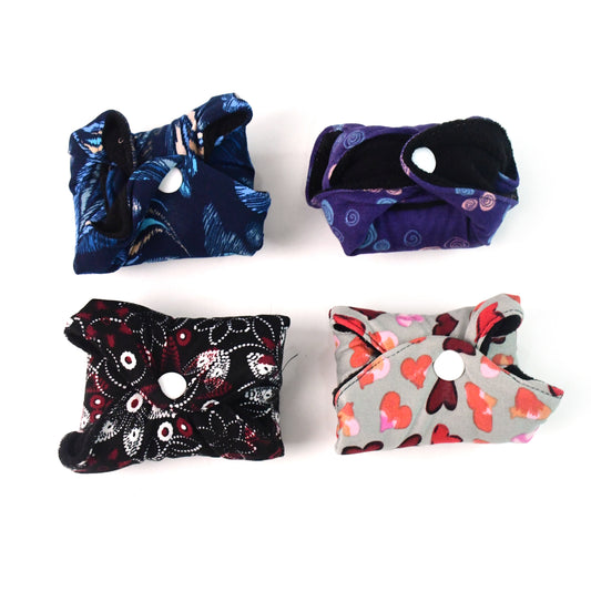 Reusable cloth sanitary pads for women by Wukusy, 4-piece set, soft fabric, eco-friendly health care product.
