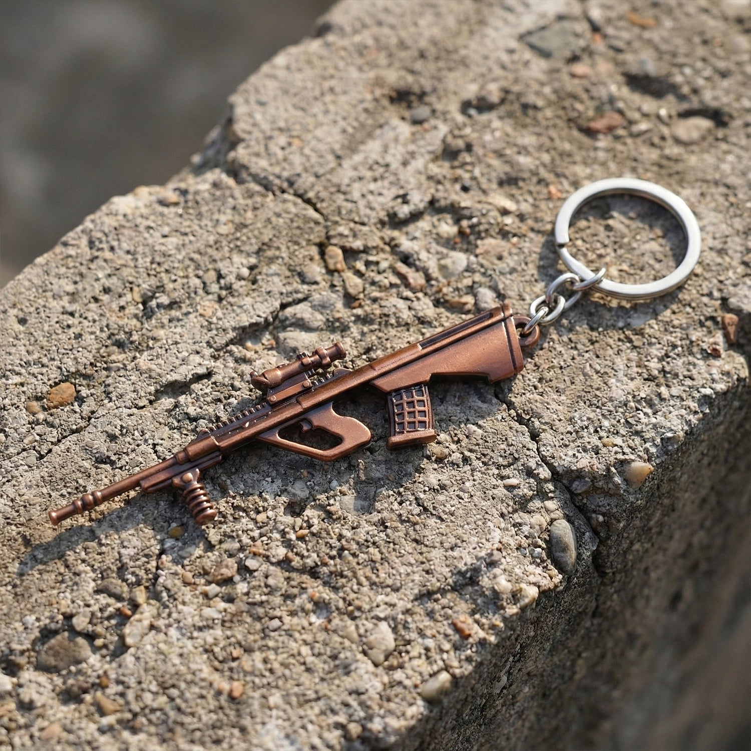 Metal gun-shaped keychain by Wukusy featuring a detailed gun design on a keyring for everyday use