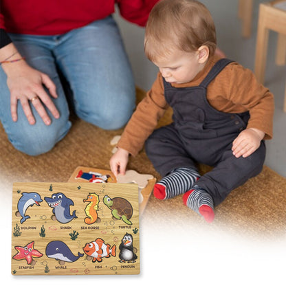 Wooden seawater animal puzzle educational toy by Wukusy featuring colorful marine animal pieces for kids' learning and play.
