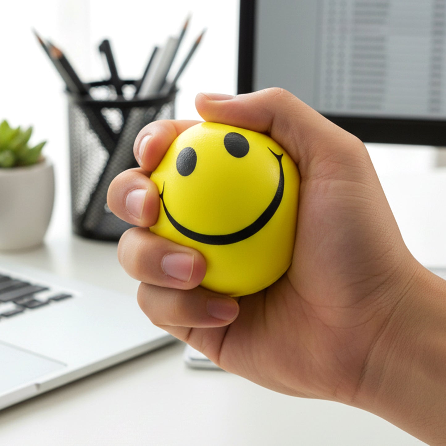 Wukusy soft foam smiley toy ball, colorful and lightweight for kids, featuring a cheerful smiley face design.