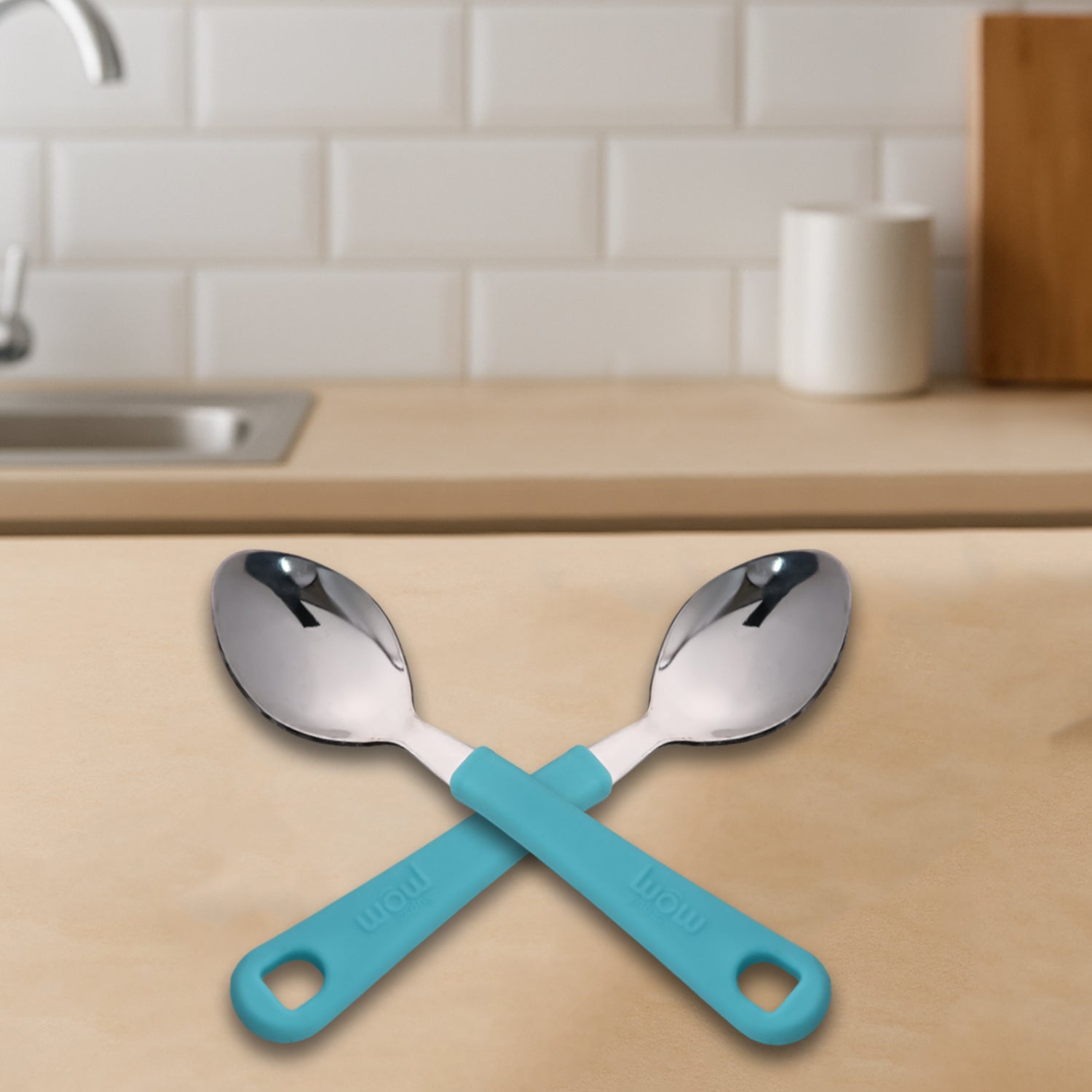 Set of six Wukusy Supermom stainless steel tea spoons displayed with reflective surfaces and ergonomic handles.