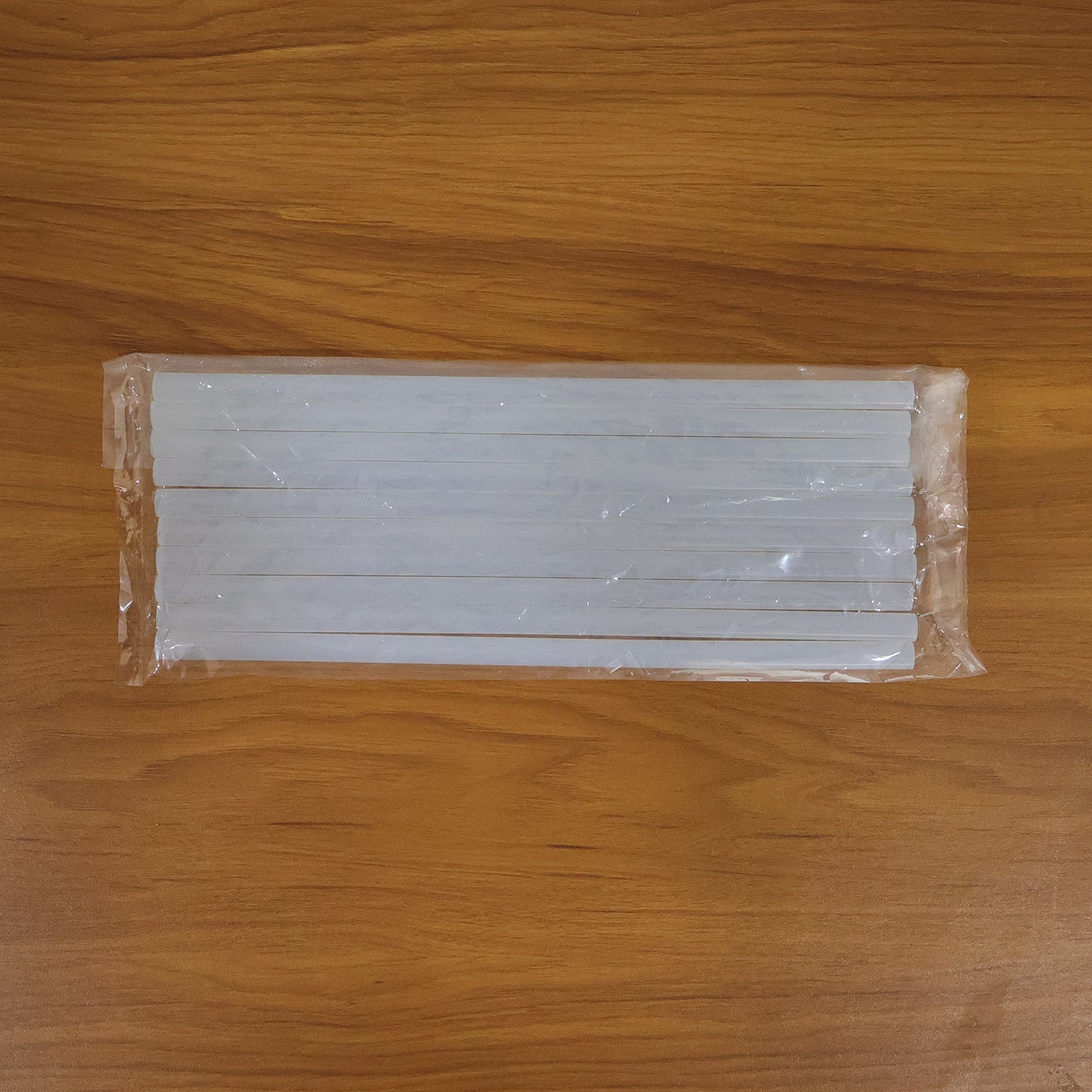 Wukusy heavy duty hot melt glue sticks, 10 pack, 29 cm long, suitable for industrial and craft bonding applications.