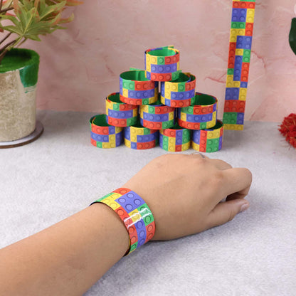 Colorful Snap Slap Bracelet Toy set by Wukusy, featuring 12 vibrant flexible bracelets for kids' play and fun.