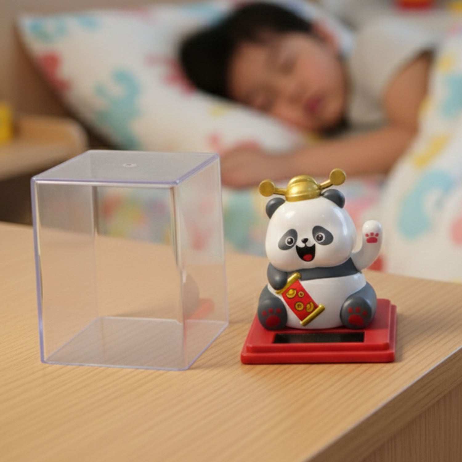 Solar powered moving hand panda showpiece by Wukusy, featuring a cute panda with a hand that moves when exposed to sunlight.
