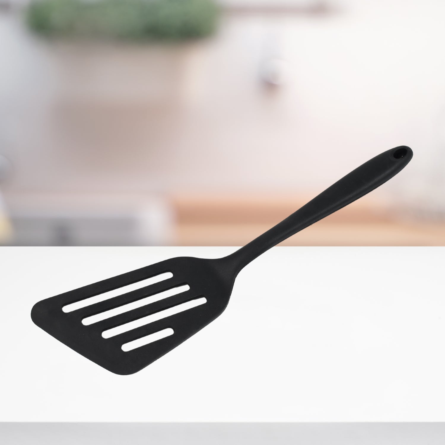 Wukusy 5381 silicone non-stick heat-resistant kitchen turner, premium kitchen tool for flipping and serving food.