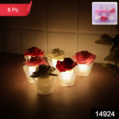 Six Wukusy LED rose flower flameless tealight candles arranged in a decorative home decor display, with soft glowing light.