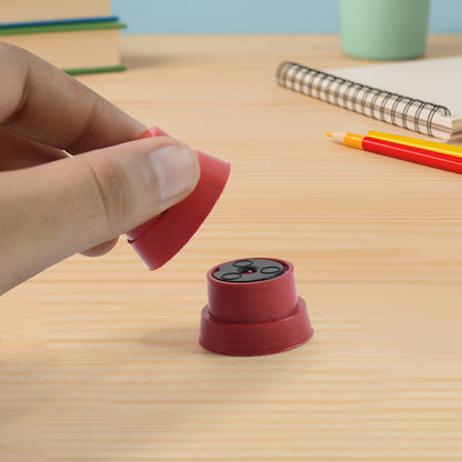 Wukusy Magic Coin Pedestal toy set for kids showcasing a fun illusion trick with a coin and pedestal in vibrant colors.