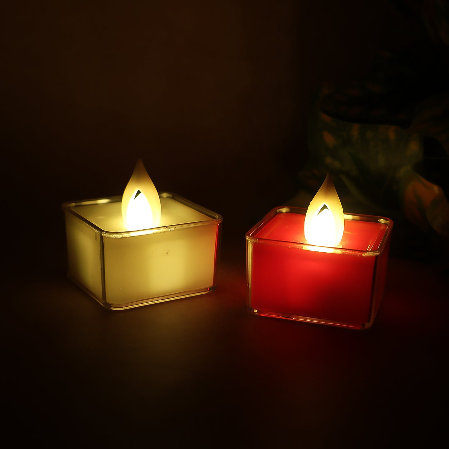 Set of nine Wukusy LED flameless tealight candles for home decor, with realistic flickering light and decorative design.