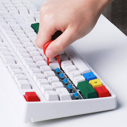Wukusy 5-in-1 multi-function computer cleaning brush with dust duster, keycap puller, and corner gap cleaner for gaming PC.