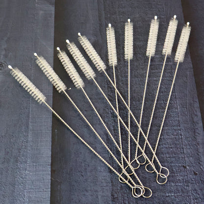 Wukusy 10-piece straw bottle cleaning brush set with various brushes for thorough cleaning of reusable bottles and straws.