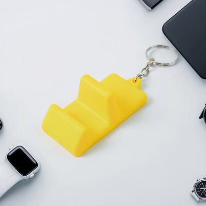 Wukusy plastic 2-in-1 mobile stand keychain showcasing a compact, portable accessory with a built-in phone stand and keyring.