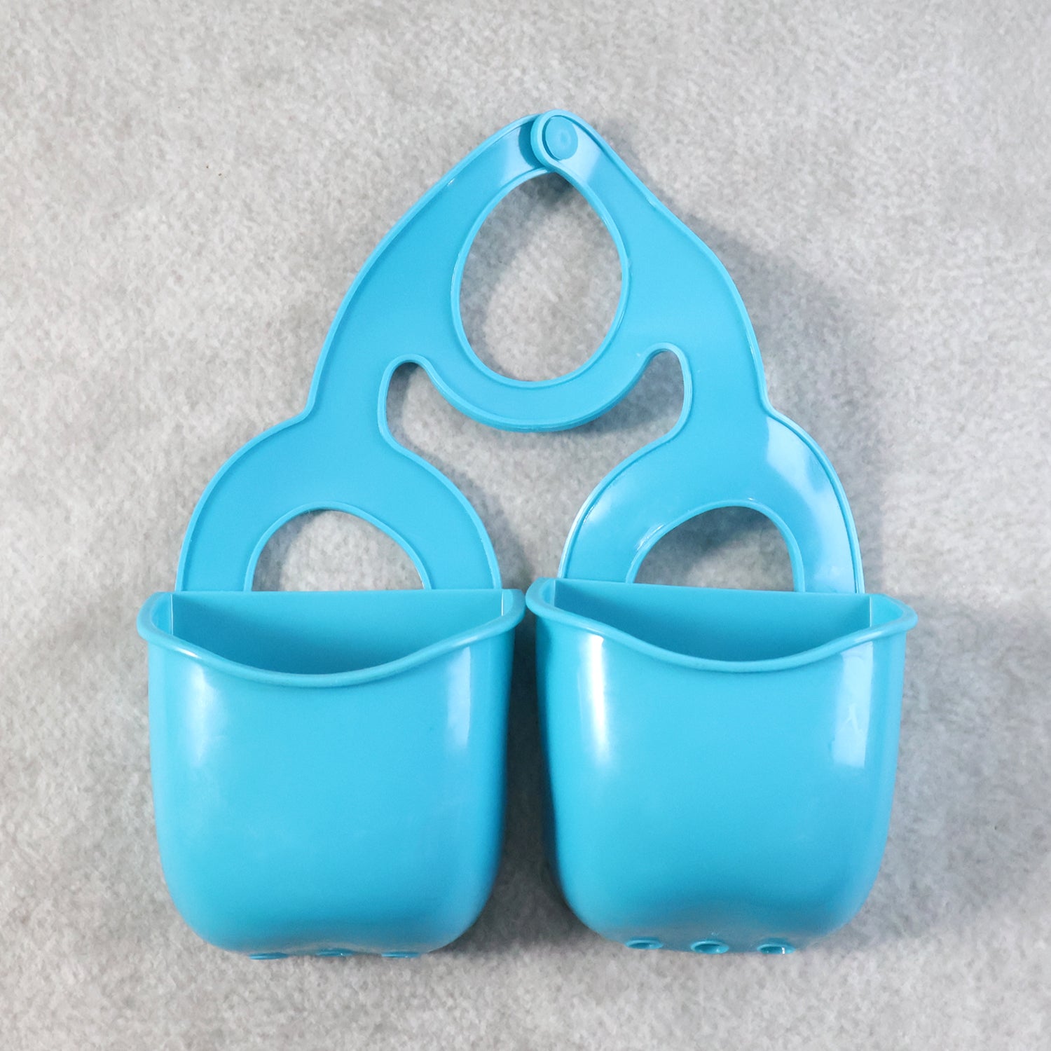 Wukusy double layer sink hanging storage basket for kitchen organization, featuring two mesh compartments for utensils and cleaning supplies.