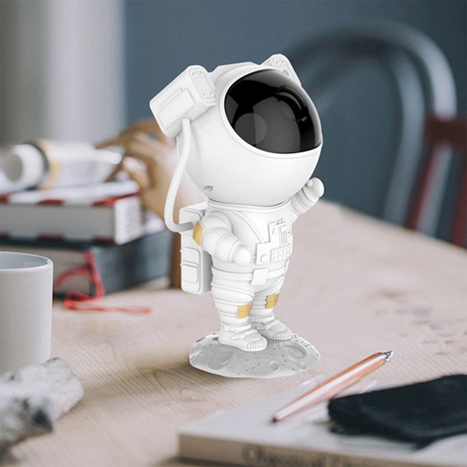 Wukusy Robot Sky Space Stars Light astronaut galaxy projector illuminating a bedroom with starry night sky patterns for kids and adults