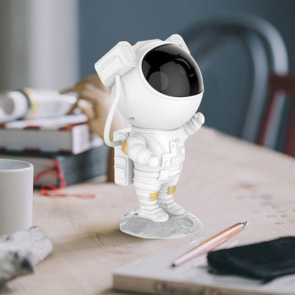 Wukusy Robot Sky Space Stars Light astronaut galaxy projector illuminating a bedroom with starry night sky patterns for kids and adults