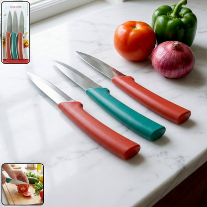 Wukusy multipurpose kitchen fruit and vegetable cutting knife set with three stainless steel knives on a wooden cutting board.
