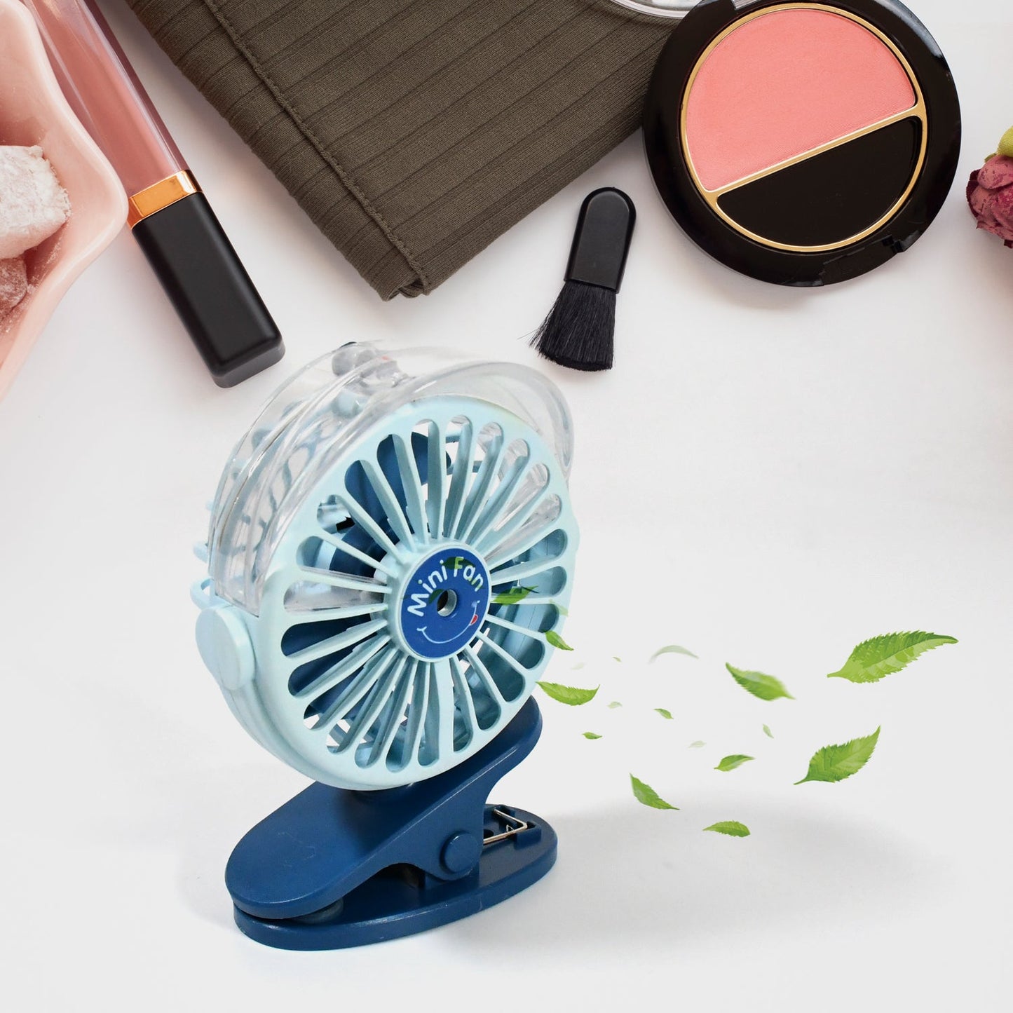 Wukusy portable clip-on mini desk fan with light, rechargeable battery, 3-speed settings, and 360° rotation for personal cooling.