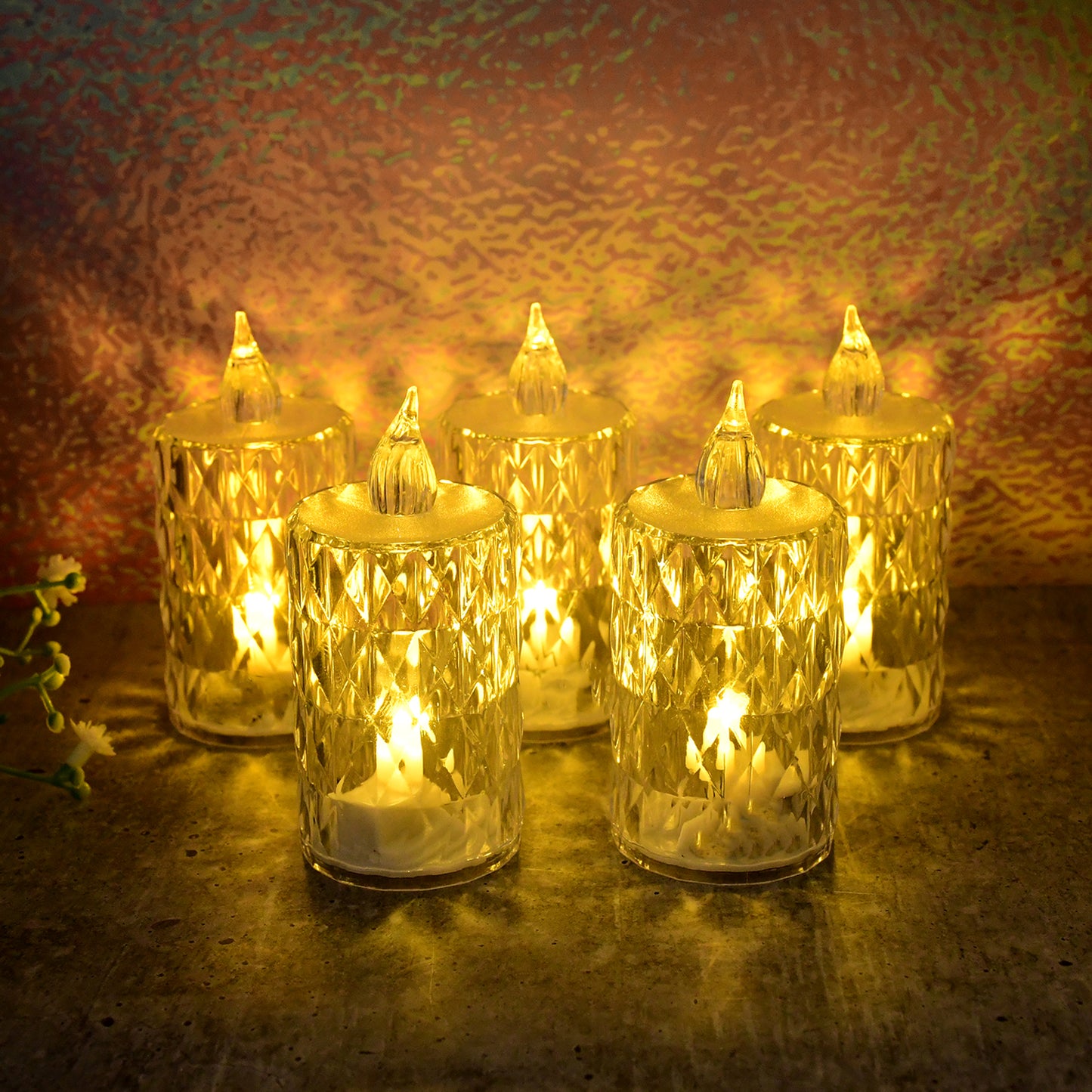 Set of five Wukusy LED crystal effect flameless candle lights with realistic flickering glow on a dark background.