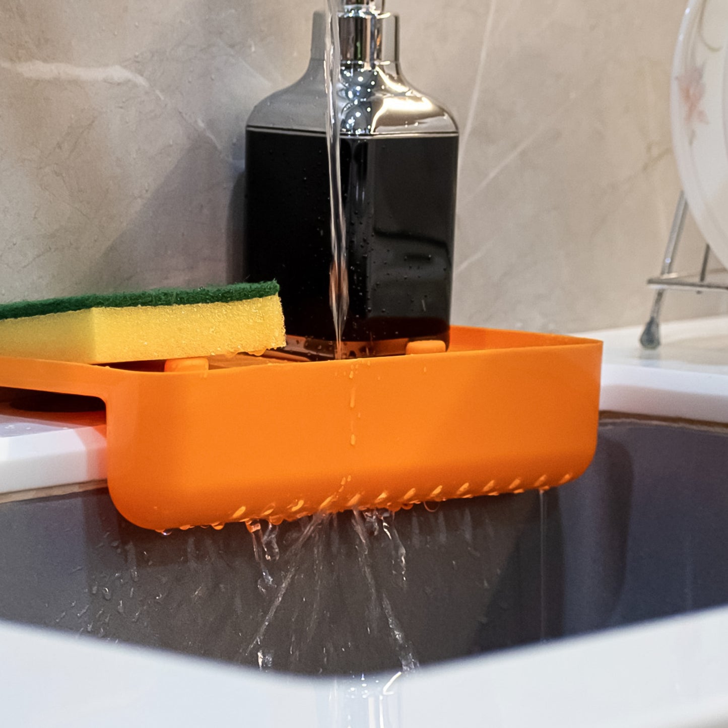 Wukusy multi-functional sink drainer shelf with colander and strainer basket for kitchen sink organization and drying.
