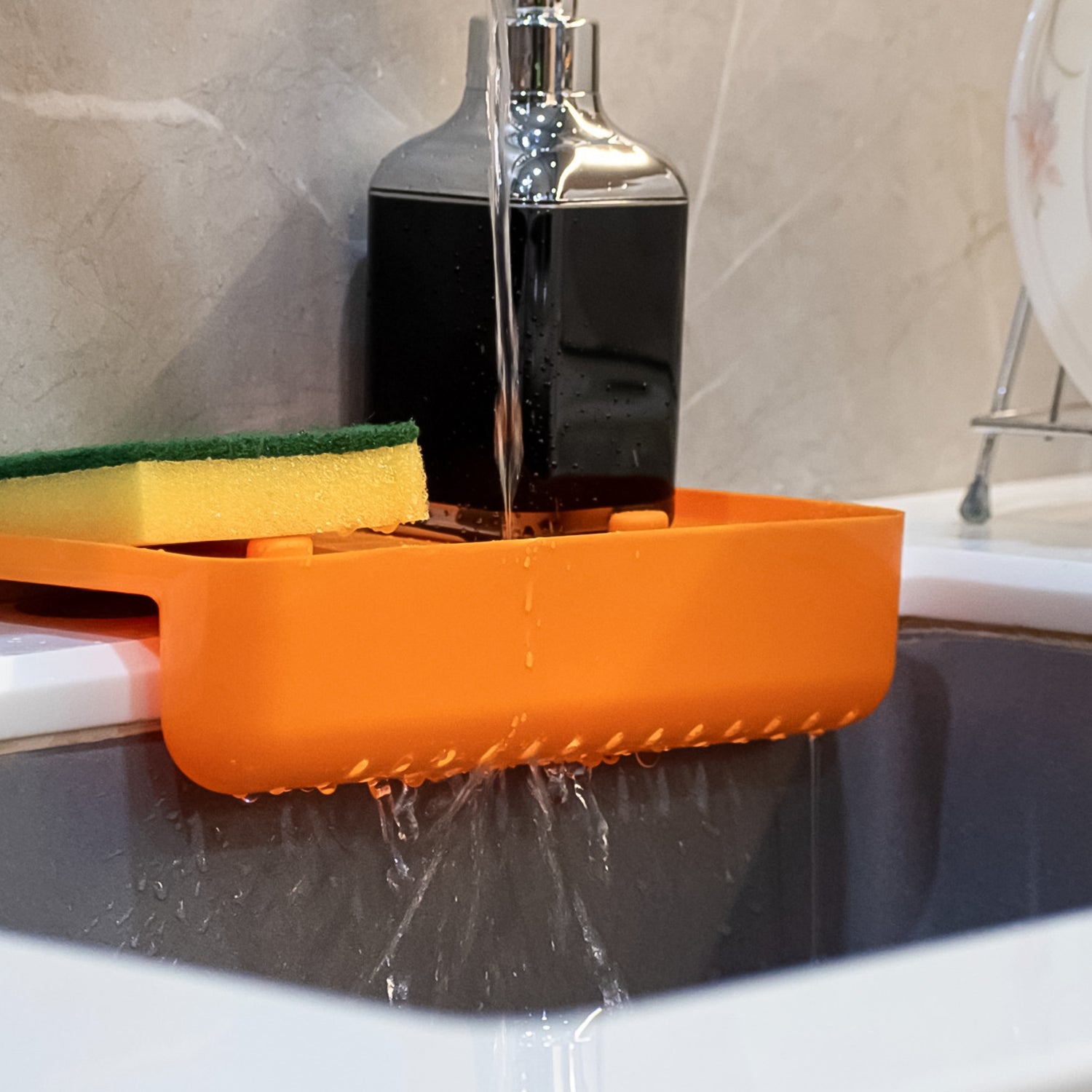 Wukusy multi-functional sink drainer shelf with colander and strainer basket for kitchen sink organization and drying.