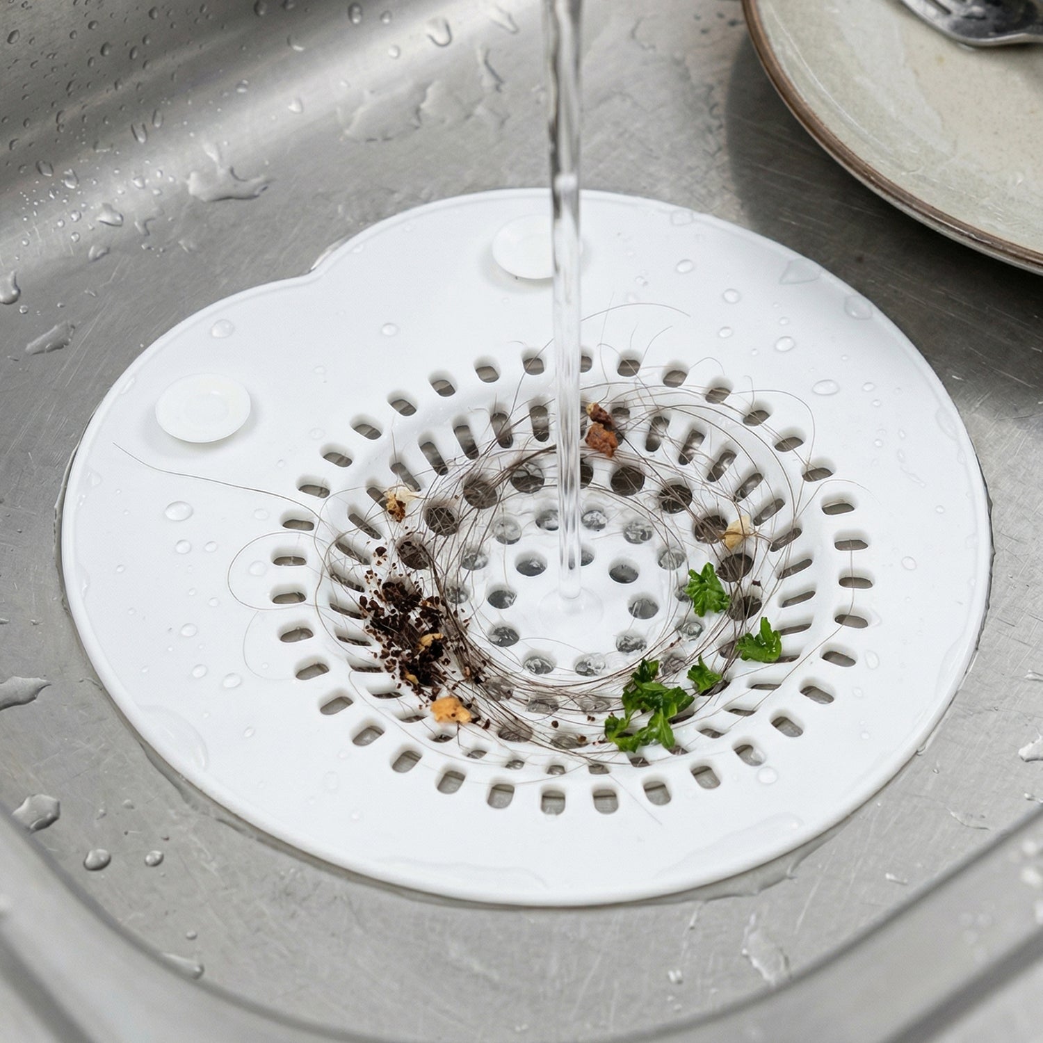 Flexible silicone sink drain strainer by Wukusy, showing a close-up of the soft, durable, and easy-to-clean kitchen sink accessory.