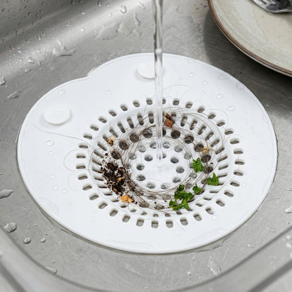 Flexible silicone sink drain strainer by Wukusy, showing a close-up of the soft, durable, and easy-to-clean kitchen sink accessory.