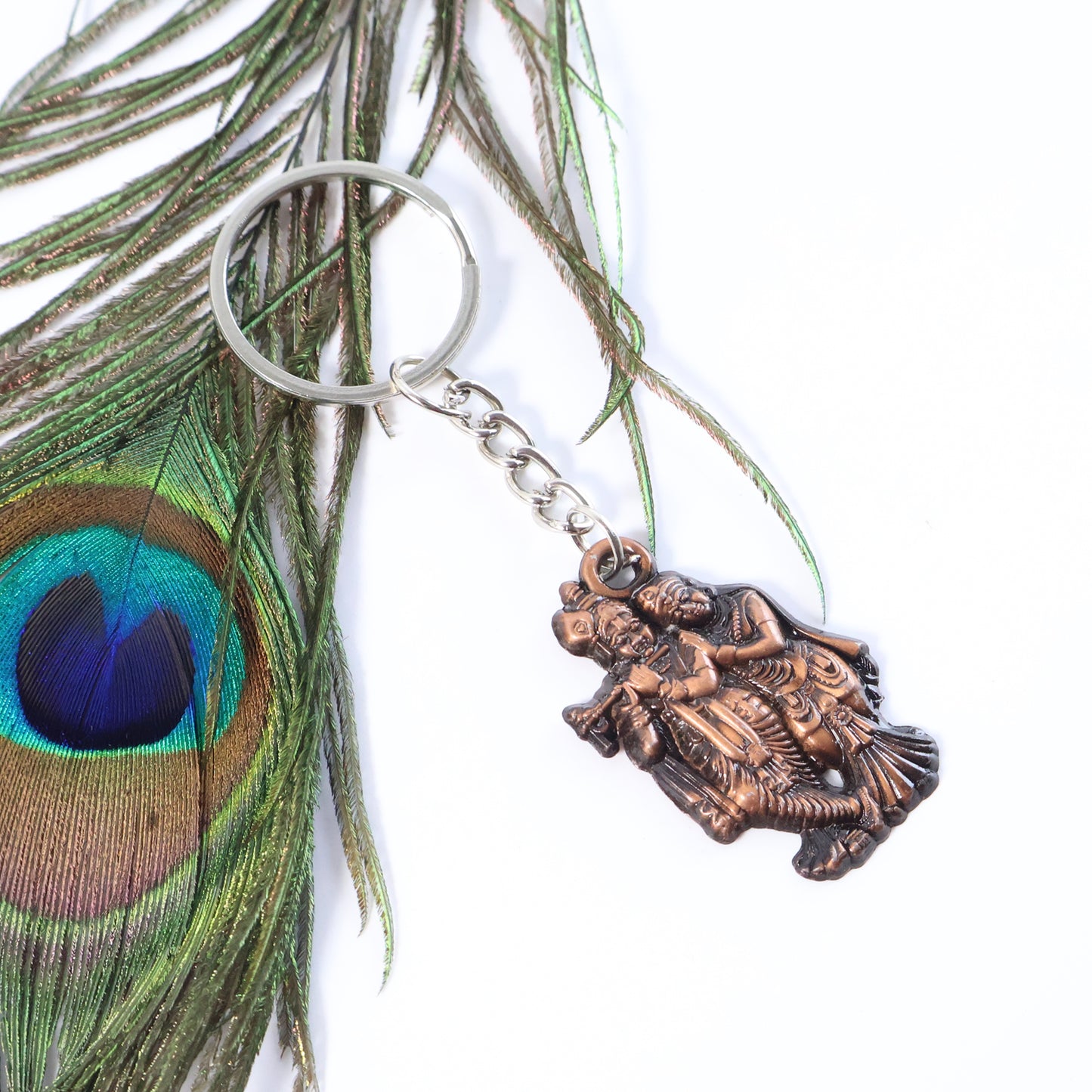 Radha Krishna metal keychain featuring detailed Hindu deity design, crafted by Wukusy, perfect for spiritual accessories.