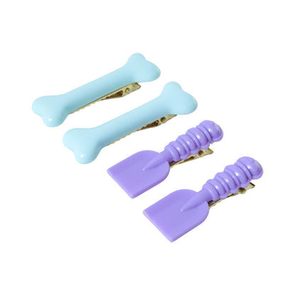 Set of four cute cartoon hair clips by Wukusy featuring colorful, playful designs perfect for children's hairstyles.