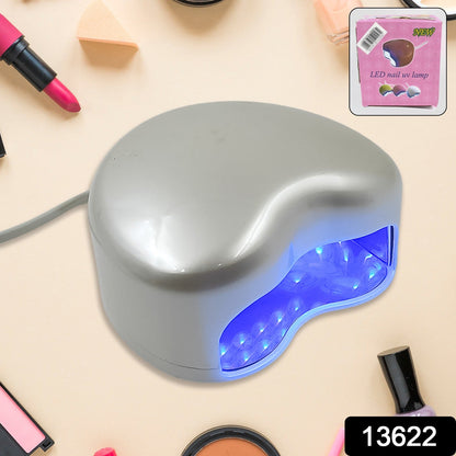 Wukusy LED UV nail lamp for gel nails, compact nail curing lamp with multiple light settings, used for quick and efficient nail drying.