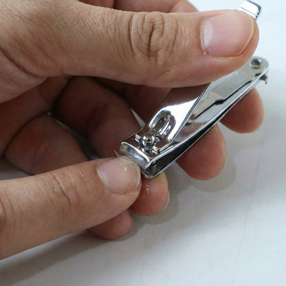 Wukusy stainless steel nail clipper set with keychain holder, includes two compact nail grooming tools on a white background.