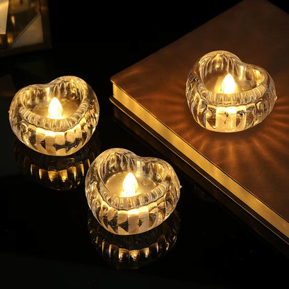 Set of 12 Wukusy heart-shaped LED flameless decorative candles with warm glow, ideal for romantic or cozy decor.