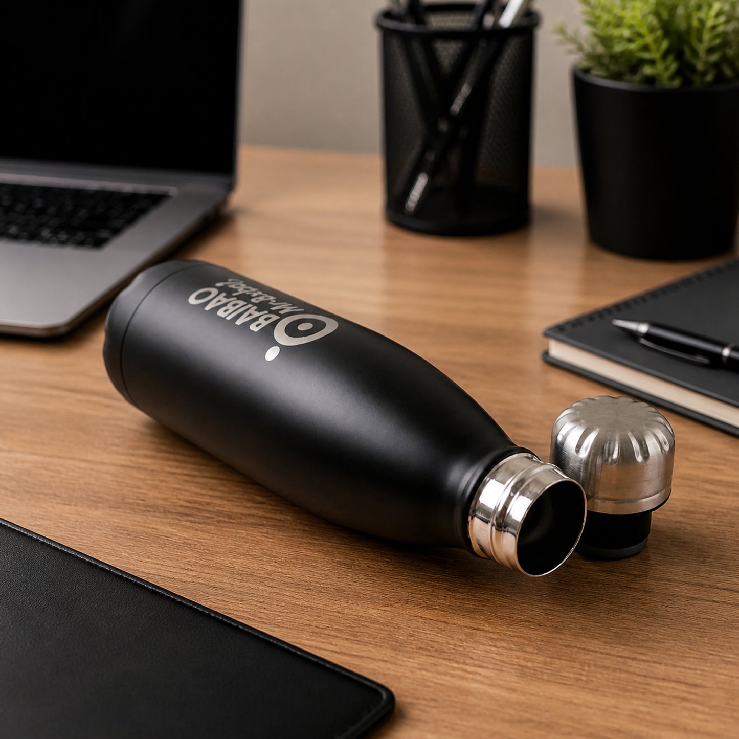 Stainless steel Wukusy water bottle with 500ml capacity, sleek design, and secure screw-on lid for hydration on the go.