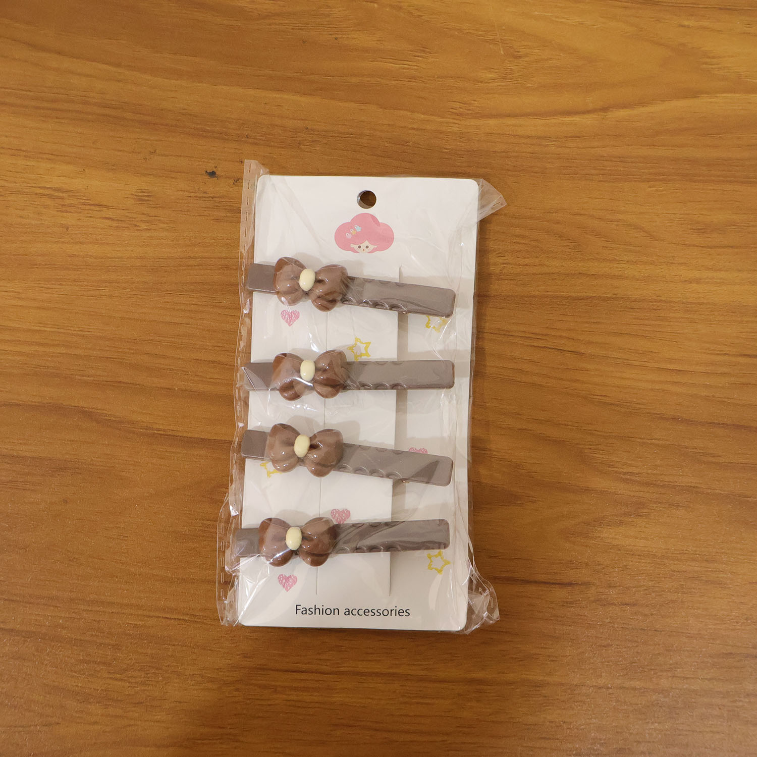 Set of four Wukusy decorative hair clips with elegant bow designs, perfect for adding a stylish touch to hairstyles.