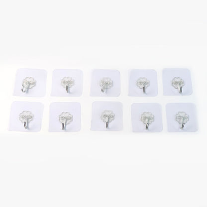 Set of 10 heavy-duty Wukusy flower adhesive wall hooks mounted on a wall for home organization and decor.