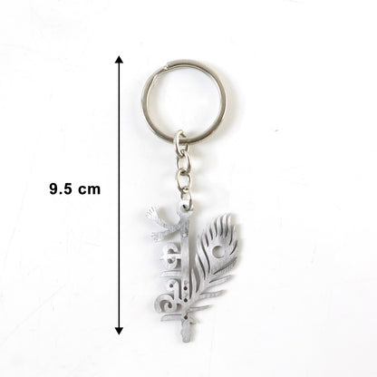 Silver metal Kanha keychain with intricate design, featuring the Wukusy brand logo and a sturdy keyring attachment.