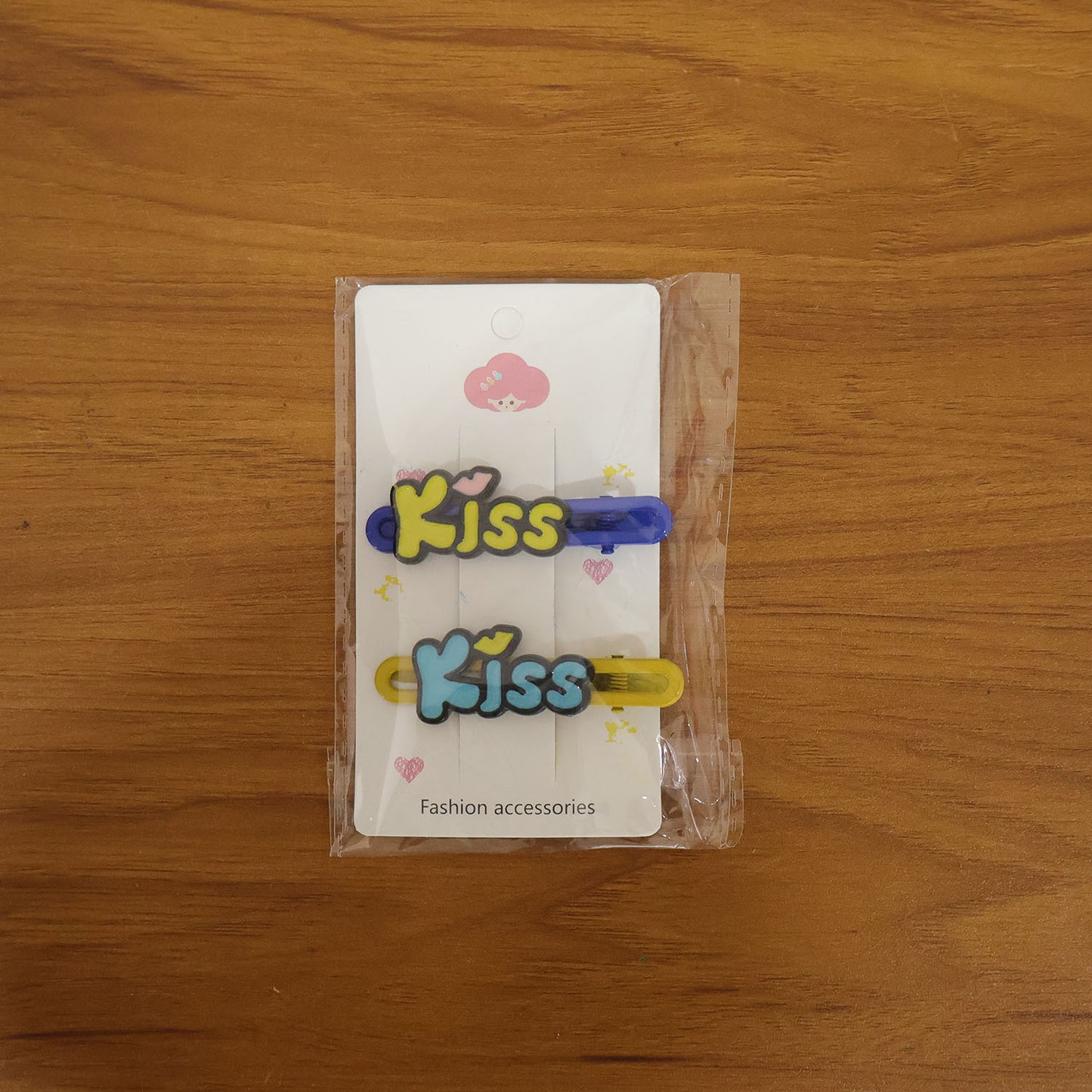 Wukusy cute kiss text hair clip set with two black and white hair accessories featuring playful kiss designs