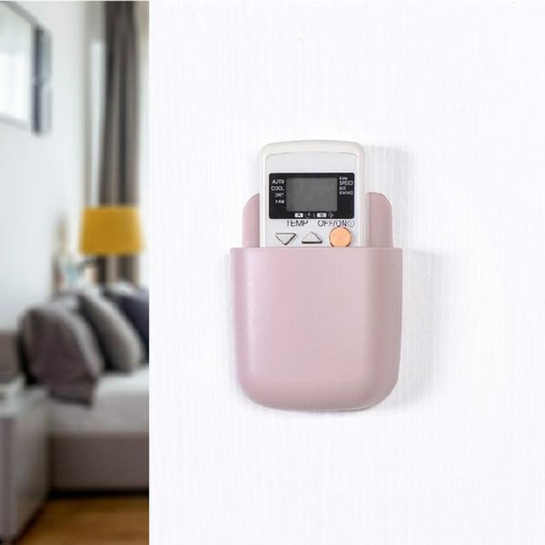 Set of four Wukusy wall-mounted storage cases with mobile phone charging ports, ideal for organizing accessories and charging devices.