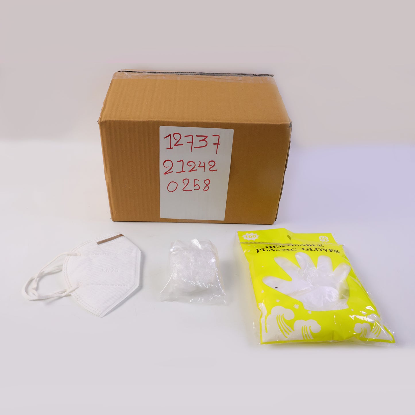 Wukusy disposable hygiene safety kit set with gloves, face mask, and sanitizer bottles for health protection.