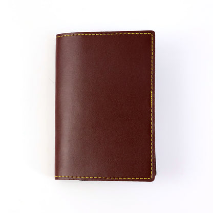 Wukusy PU leather slim travel wallet with multiple card slots, designed for easy organization and secure carrying.