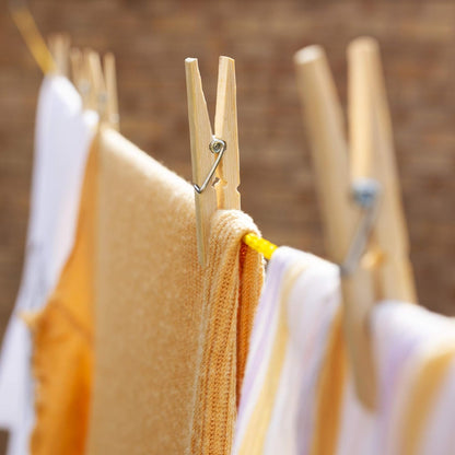 Set of 20 heavy-duty bamboo wooden cloth clips or pegs from Wukusy, ideal for laundry and hanging clothes.
