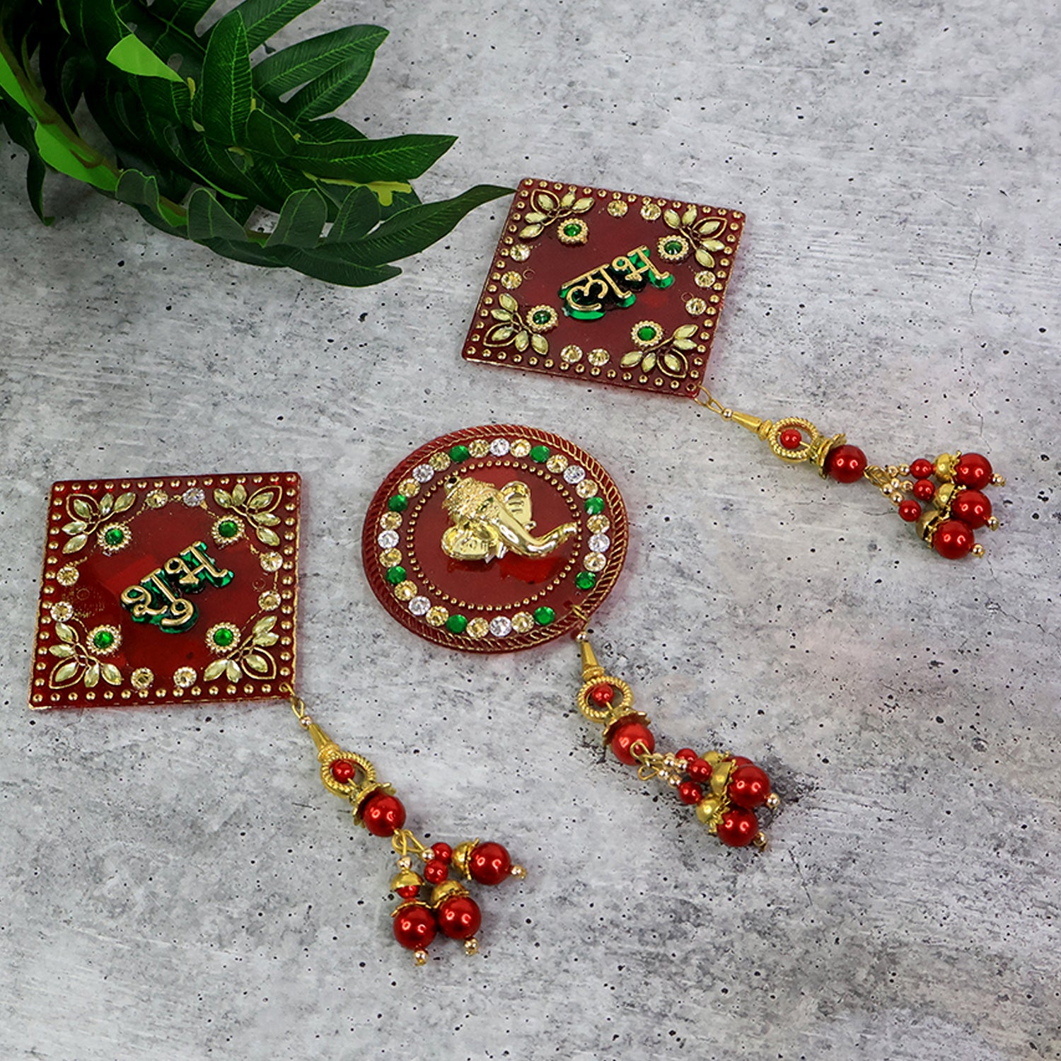 Decorative wall hanging set with Shubh Labh and Ganesh designs, Wukusy home decor, featuring three colorful wall art pieces.