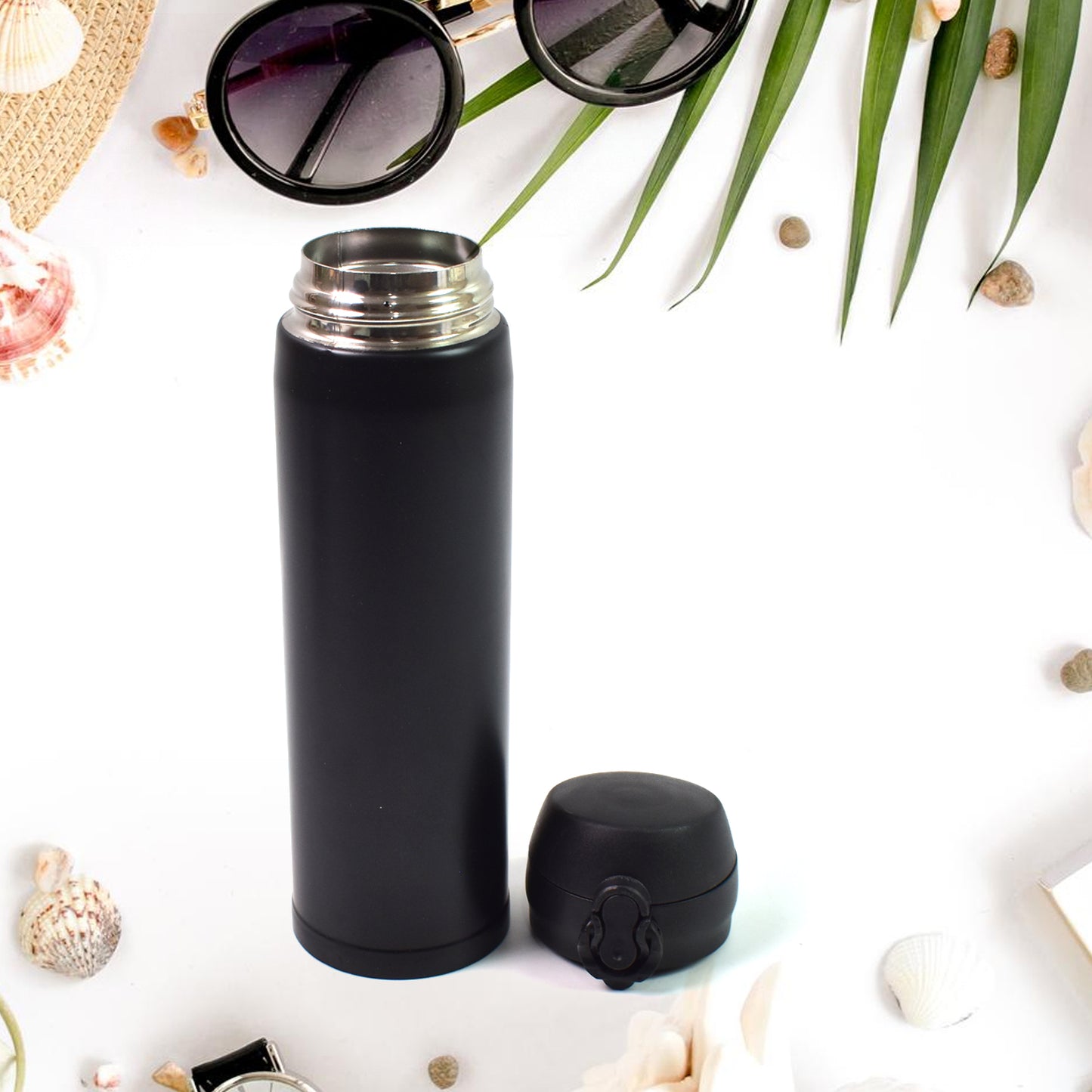 Insulated stainless steel water bottle for kids in mixed colors, 500ml capacity by Wukusy, durable and leak-proof for children.