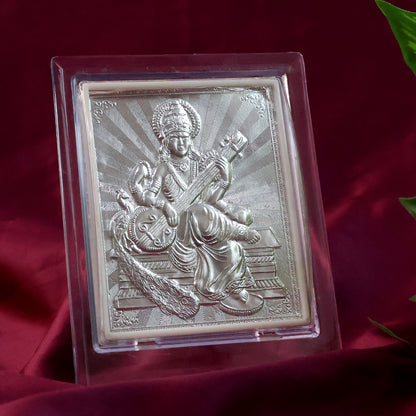 Elegant silver Saraswati Maa photo frame with stand, decorative home decor piece by Wukusy showcasing intricate design.