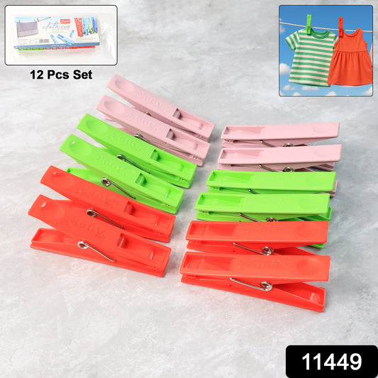 Set of 12 Wukusy durable plastic cloth clips with stainless steel springs, strong grip laundry pegs for home improvement tasks.
