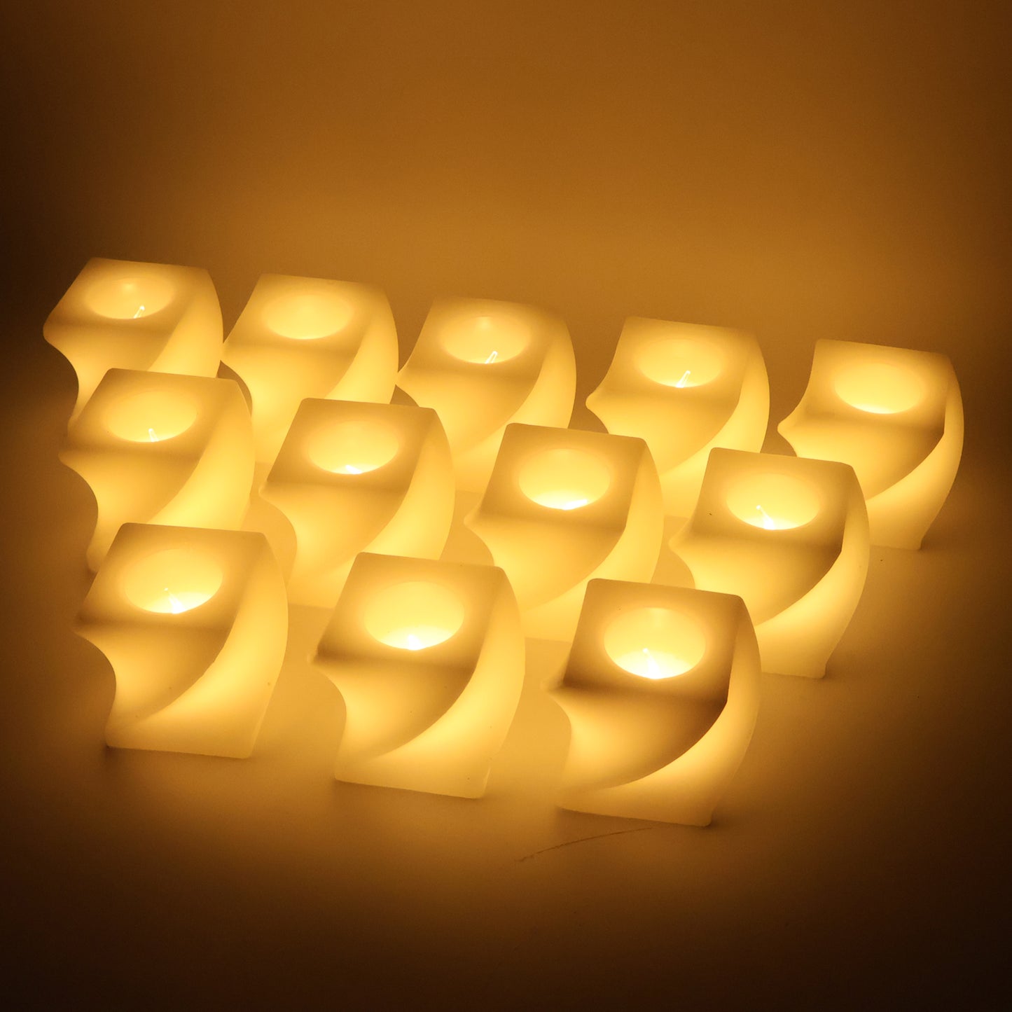 Set of 12 Wukusy LED flameless square decorative candles, tealight lamps for home decor, safe and realistic flame effect.