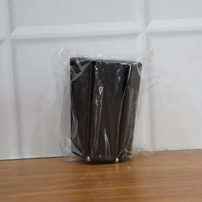 Foldable insulated trivet mat by Wukusy for hot pots, heat-resistant and portable for kitchen use, shown in a home setting.