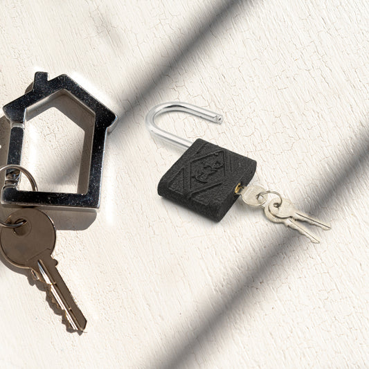 Wukusy black iron padlock with brass core, waterproof and anti-theft, suitable for outdoor gates, doors, and sheds.