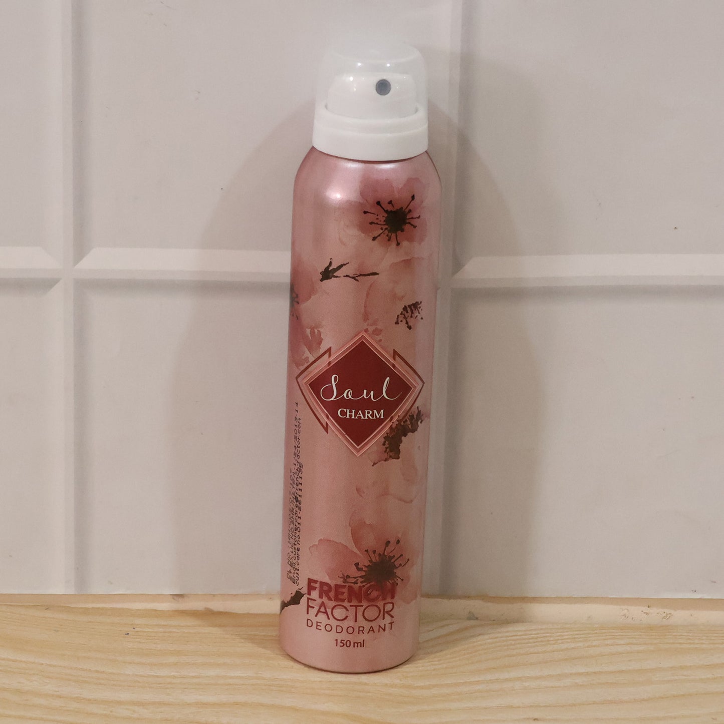 Wukusy French Factor Soul Charm deodorant body spray bottle, 150ml, with sleek packaging and spray nozzle visible.