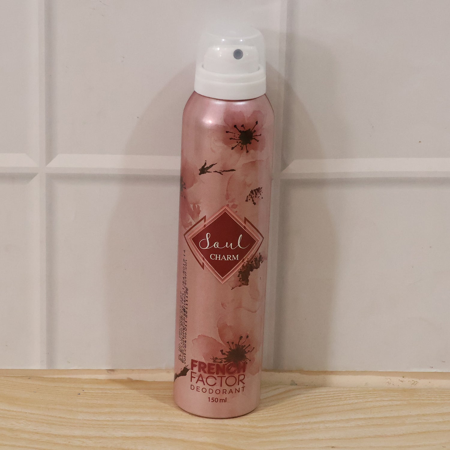 Wukusy French Factor Soul Charm deodorant body spray bottle, 150ml, with sleek packaging and spray nozzle visible.