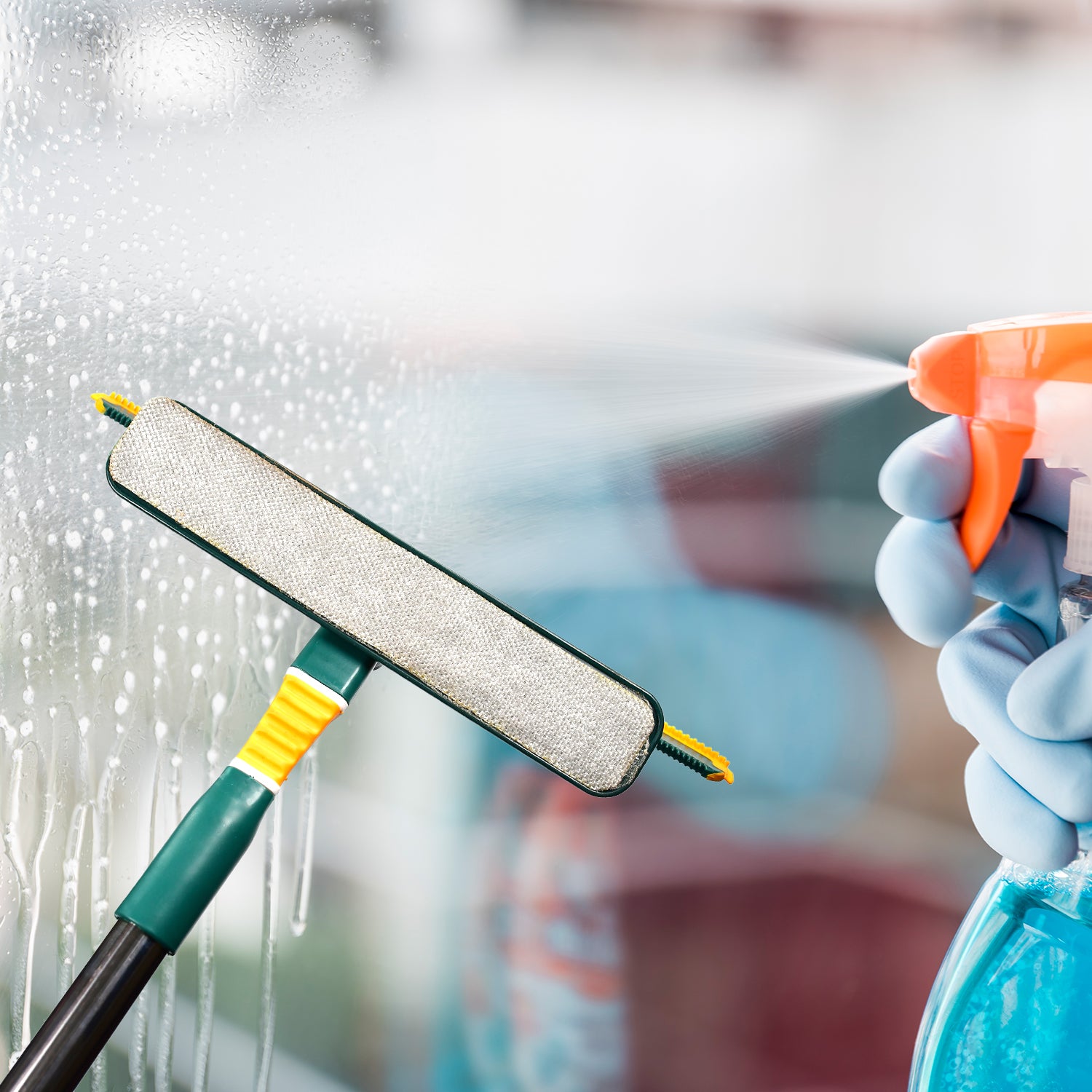 Wukusy 3-in-1 glass wiper for household and office cleaning, shown wiping a glass surface and dust removal.
