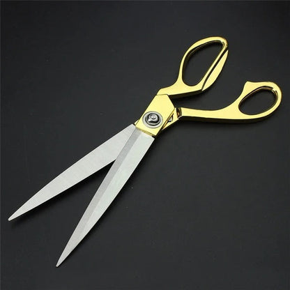 Golden stainless steel tailoring scissors for fabric cutting, professional quality, with sharp blades, ideal for home improvement projects.